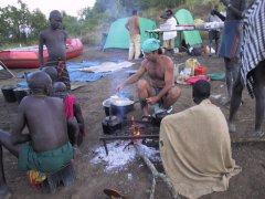 Gary Lemmer cooking for the Mursi in Ethiopia
